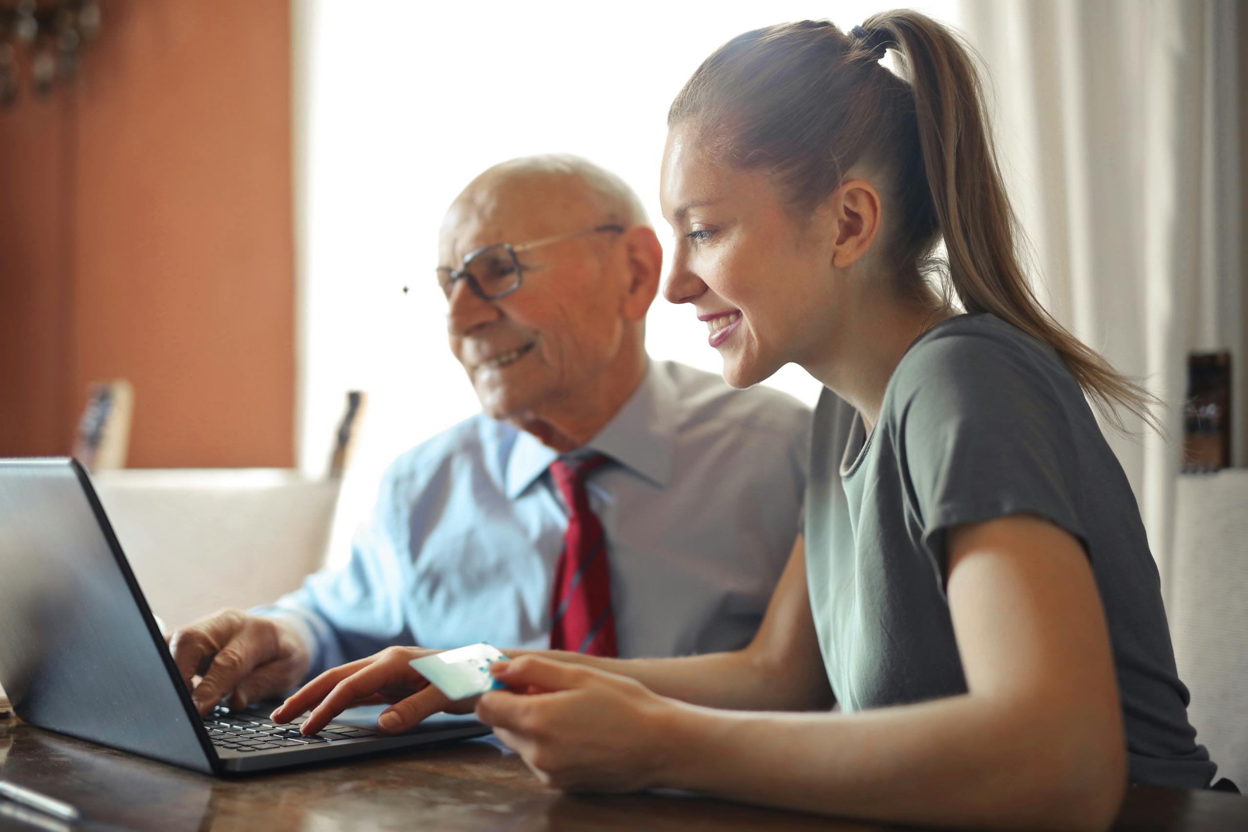 Web designer collaborating with business owner on custom website design